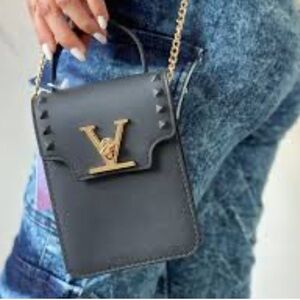 Elegant Black Crossbody Bag with Gold Accents